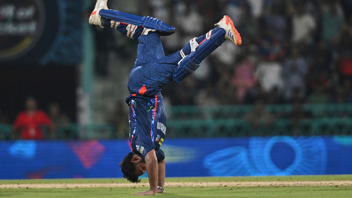 Celebrating punt by hitting the ball