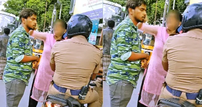 Girlfriend attacks boyfriend in the middle of the road