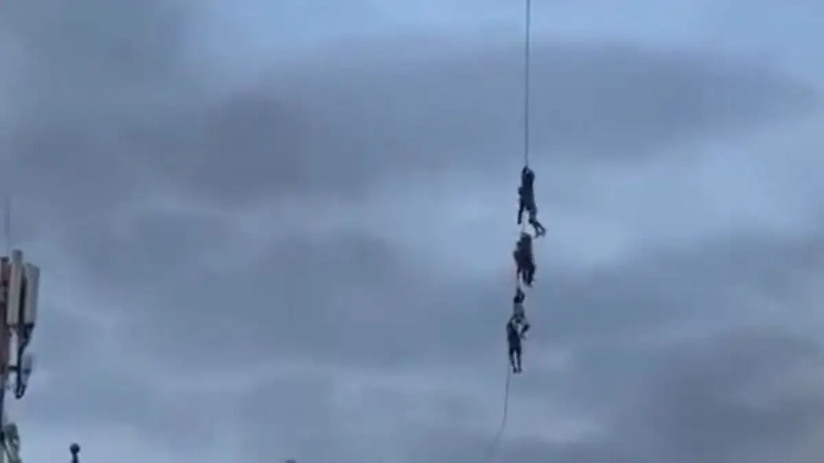 Videos of Nepali politicians and government officials clinging to ropes on army helicopters