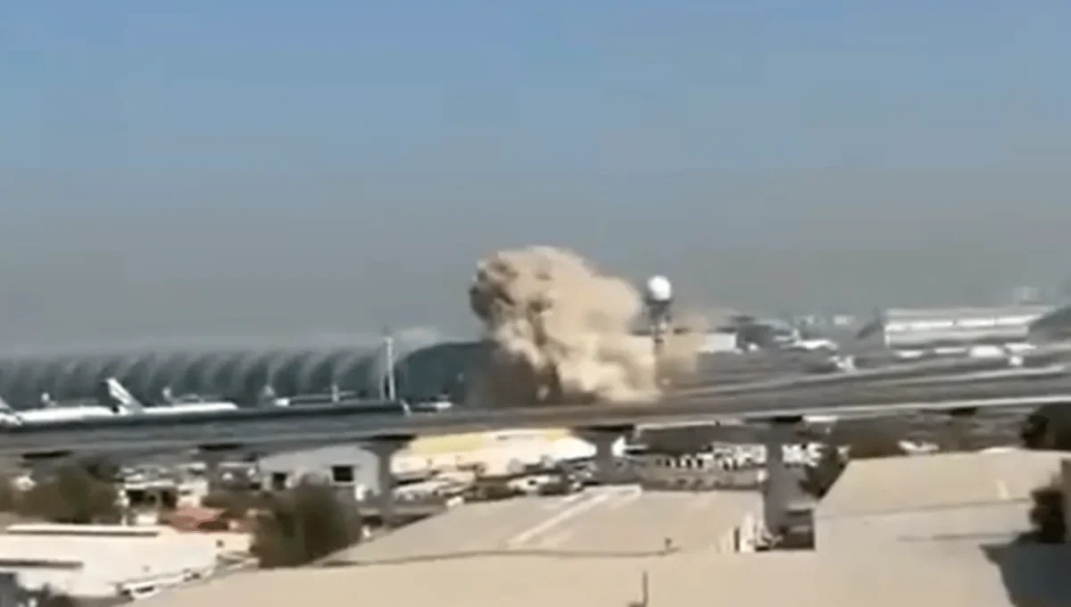 Dubai Airport drone attack March 7 2026 flight suspension news