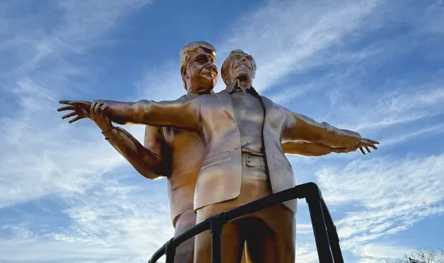 trump-epstein-titanic-pose-statue-washington-dc-national-mall-secret-handshake